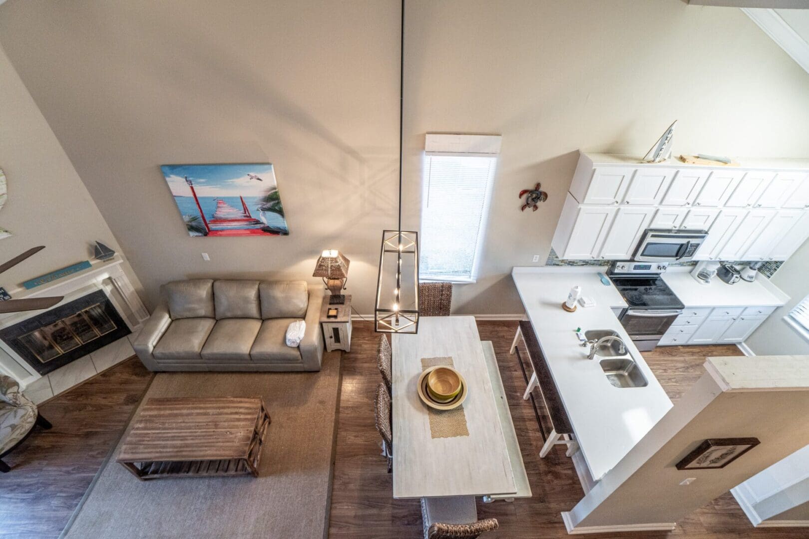 A living room with a table and chairs