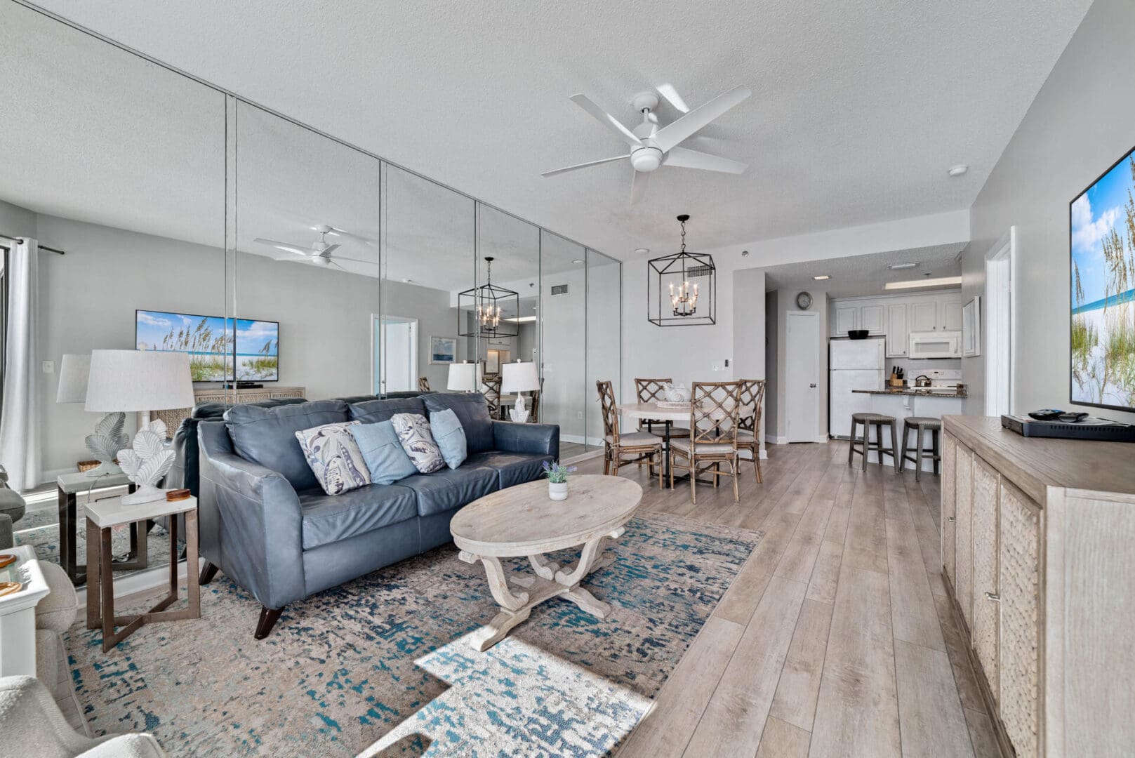 A living room with a couch and chairs in it