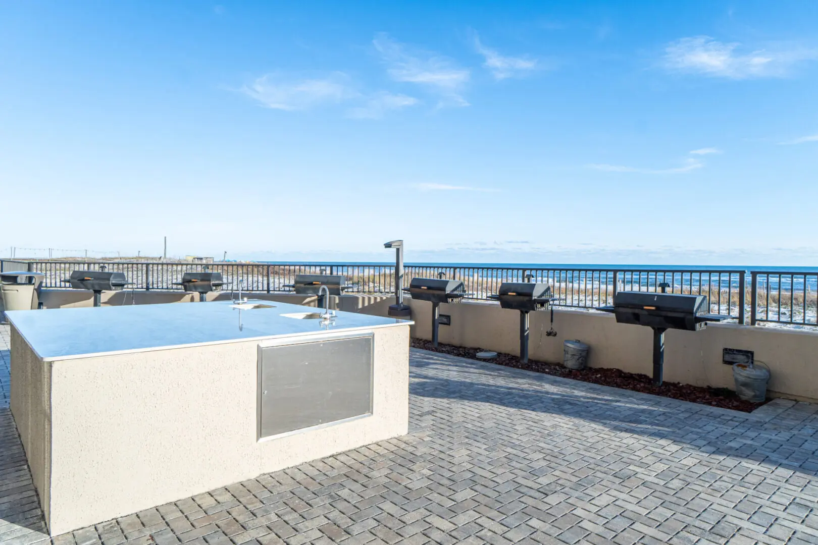 A hot tub on the side of a beach.